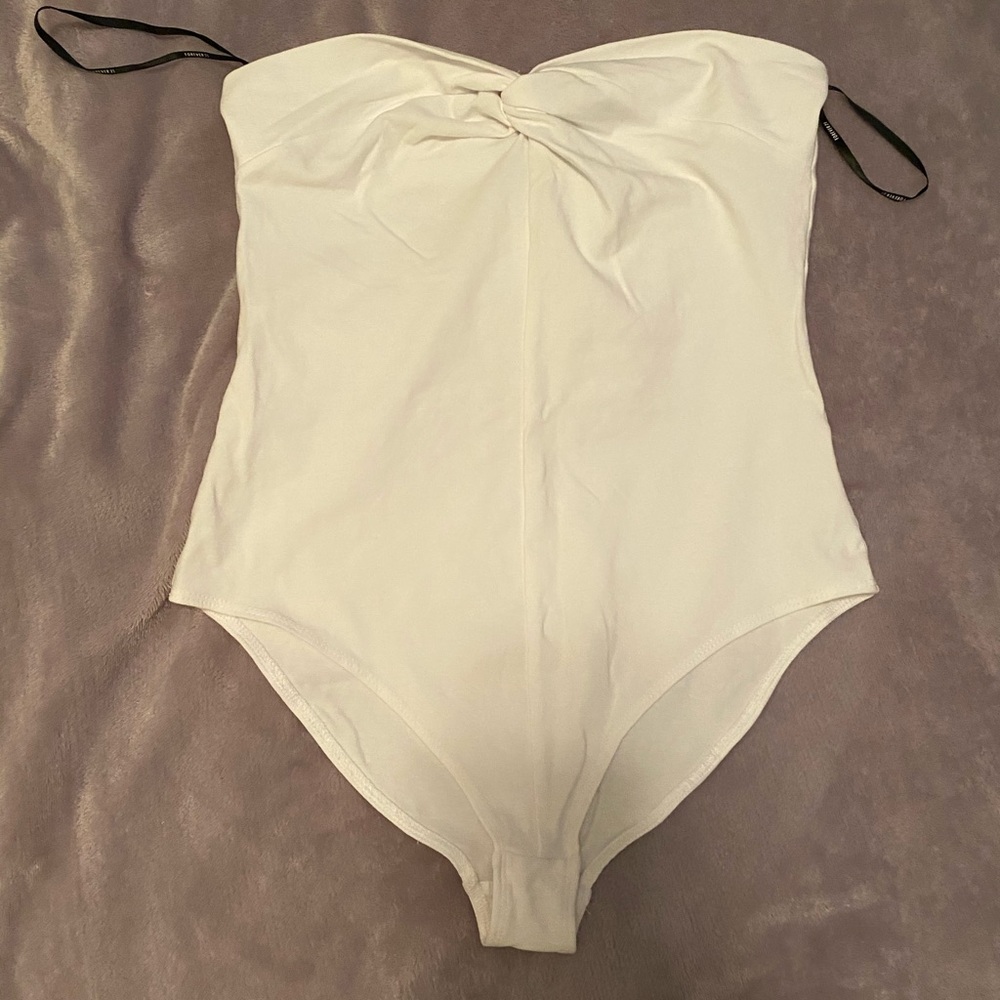 Strapless size small body suit